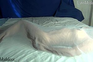Silly Latina Strips Naked Under Sheets