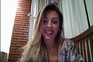 Naomi deepthroats dildo on webcam.