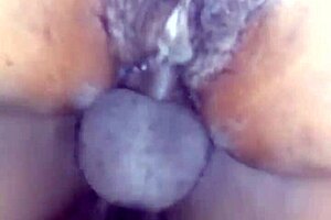 watch this ebony babe squirt on my big black cock