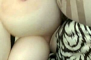 Man fucks his wife while camera focuses on her 42F natural tits.