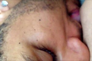 Intriguing close-up of couple licking shaved teen pussy at home