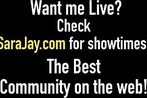 Sara Jay fingers her shaved pussy with vibrator to orgasm.