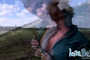 Leila, the blonde babe, teases outdoors with her big tits and nude body.