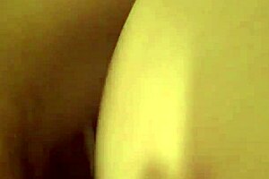 Exploring intimate moments with a brunette in a private setting