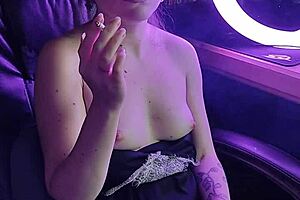 Hey, check out this cute asian lady lighting up a cigarette in a sexy way