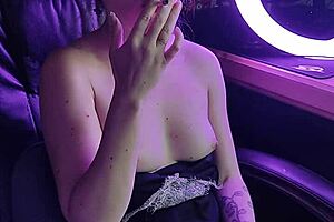 Hey, check out this cute asian lady lighting up a cigarette in a sexy way