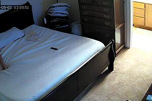 Wow, check this bedroom camera capturing my girlfriend in double penetration! She's taking a 10-inch dildo like a pro with her friend.