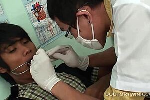 Asian gay threesome engages in kinky medical fetish fucking and ass sucking