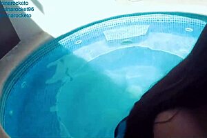 d va cosplayer soaking in a steamy bath