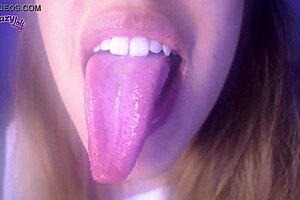 Long tongue licks and sucks fingers with spitting and deepthroat fingering on webcam
