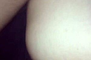 a young brunette beauty explores her small natural tits in an erotic solo