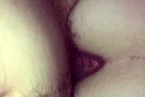 a young brunette beauty explores her small natural tits in an erotic solo