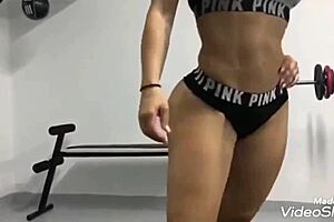 Blonde Fitness Girl Pumps Iron At The Gym!