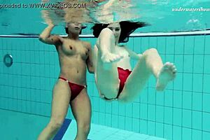 Nataly Gold, that solo teen pornstar, fingers her small tits and pussy casually