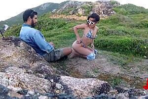 Does this milf suck like a pro on the rocks?