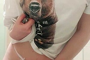 Beautiful horny woman fingers wet pussy in bathroom, moaning to orgasm