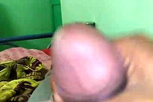 Teen boy feels intense pleasure during a passionate gay handjob session with his partner