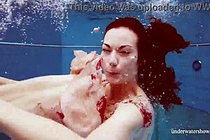 Sexy Italian Martina Seduces in Underwater Scene