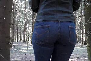 natasha posing naked in a wild forest