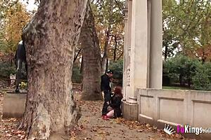 Redhead tourist gets bent over for a blowjob and doggystyle fuck in Madrid park