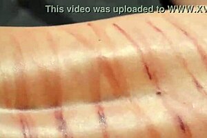 brutal domina whips her bound redhead slave hard!