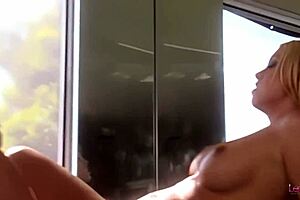 Blonde lesbians lick pussy in the bath before dildo fucking