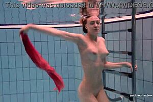 Slutty Teen Swims and Strips Underwater