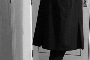 Crossdresser In Uniform Self-Binds With Handcuffs