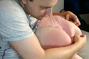 in a homemade setting, a chubby redhead amateur moans while spanking her huge round ass