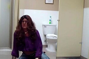 staci onit on the bathroom floor in a public outdoor fetish scene