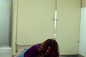 staci onit on the bathroom floor in a public outdoor fetish scene