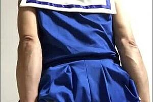 in the cheerleading squad, a crossdressing ladyboy engages in anal play with toys and cum.