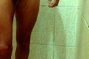 Young Well-Endowed Guy Showcases His Dick In The Shower