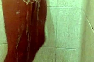 Young Well-Endowed Guy Showcases His Dick In The Shower