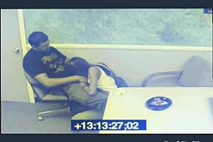 Black babe passionately sucks cock while waiting, captured on CCTV