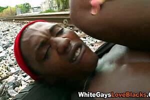 Watch the interracial hunk jizz all over that ebony ass in public.