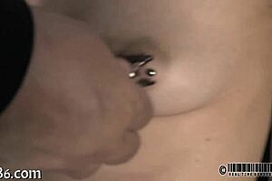 Stripping in Tiny Iron Cage, Clothes Ripped, Contrasting Freedom and Confinement