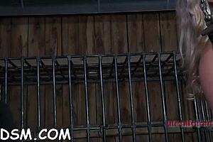 The blonde slave uses a toy to masturbate and cum hard