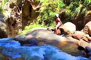 lilyan masturbates by river with dildo