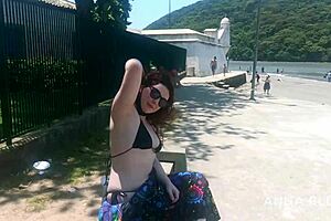 naked chick just chillin’ on the public beach, wow