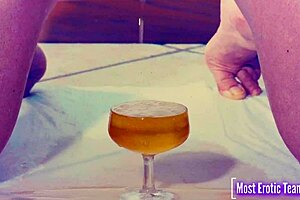 She Enjoys Pissing Into Glasses While Playing Wet Tits Game