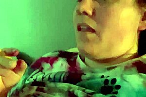 Wife talks dirty while smoking a cigarette.