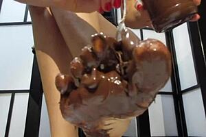 Feet Covered in Chocolate Cream