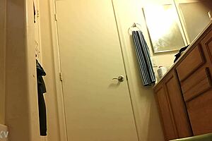 Is This the Sexiest Girl Changing in the Room?