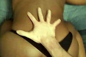 Ebony Tinder girl stretched out again with panties to the side - cumshot?