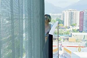 blonde brazilian tattooed woman wakes up horny in rio de janeiro, strips naked at the window, and gets fucked doggystyle by her husband