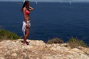 Chick In Bikini Strips Seductively By Cliff