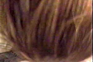 Busty brunette sucks cock in lingerie and receives cumshot.