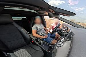 I was jerking off in the car when a stranger girl caught me and helped finish with her mouth, swallowing my cum.