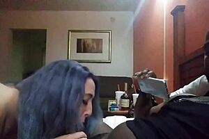 In a hotel room, she sucks big black cock and gets her pussy eaten out.